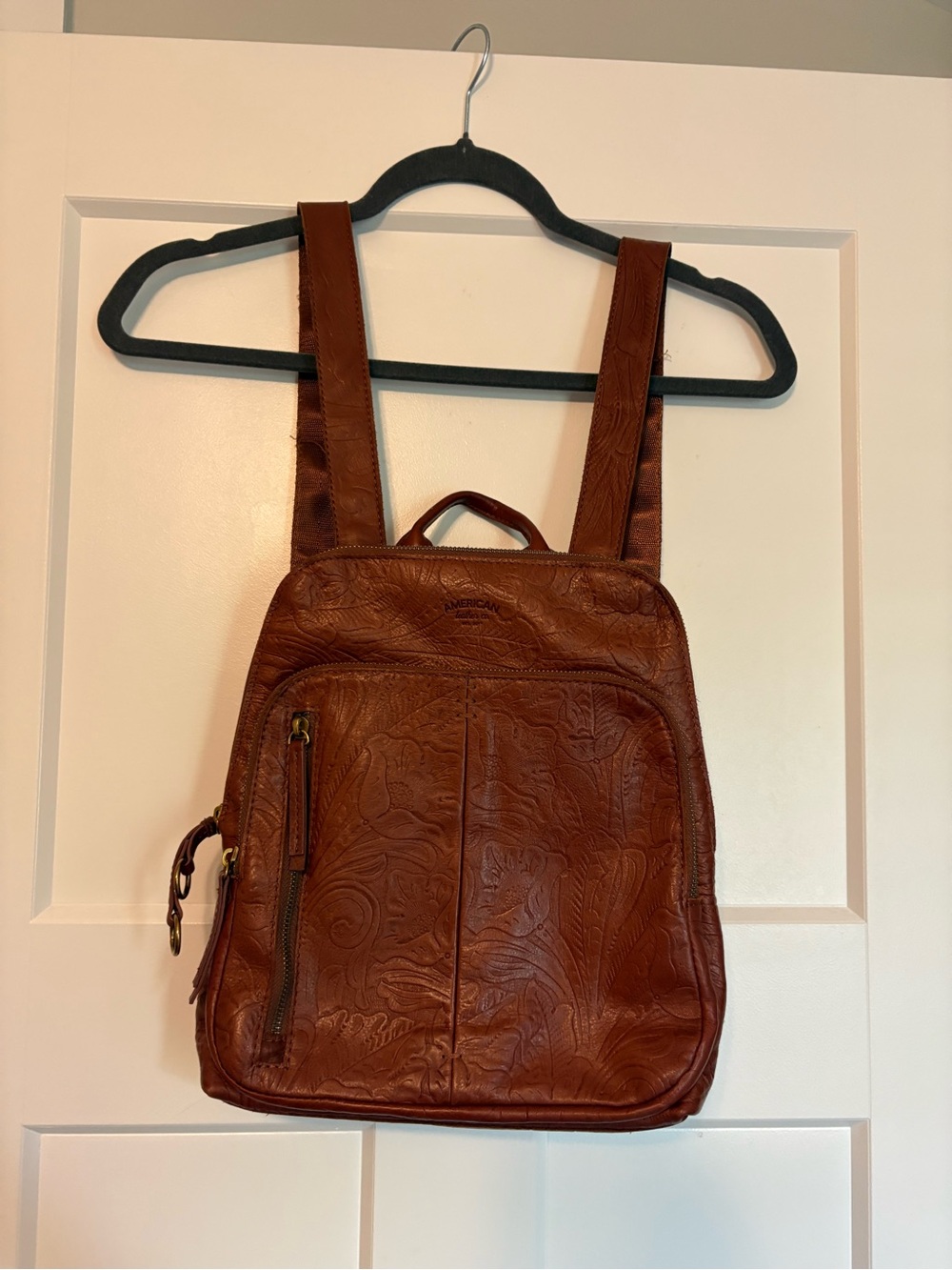 Womens Brown Leather Embossed Backpack